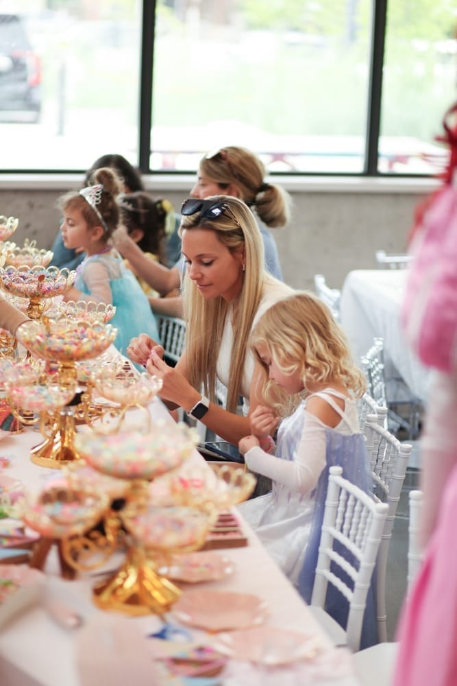 Enchanted Ball craft table set up with golden bead towers